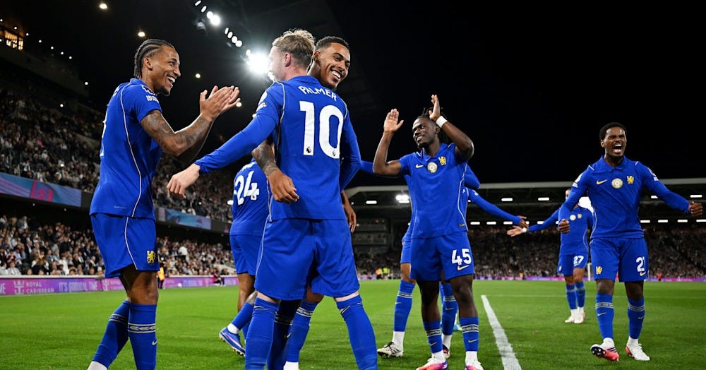 Chelsea players celebrating together on the pitch