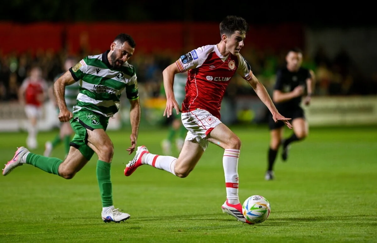 A St Patrick’s Athletic player carrying the ball against Shamrock Rovers at Richmond Park
